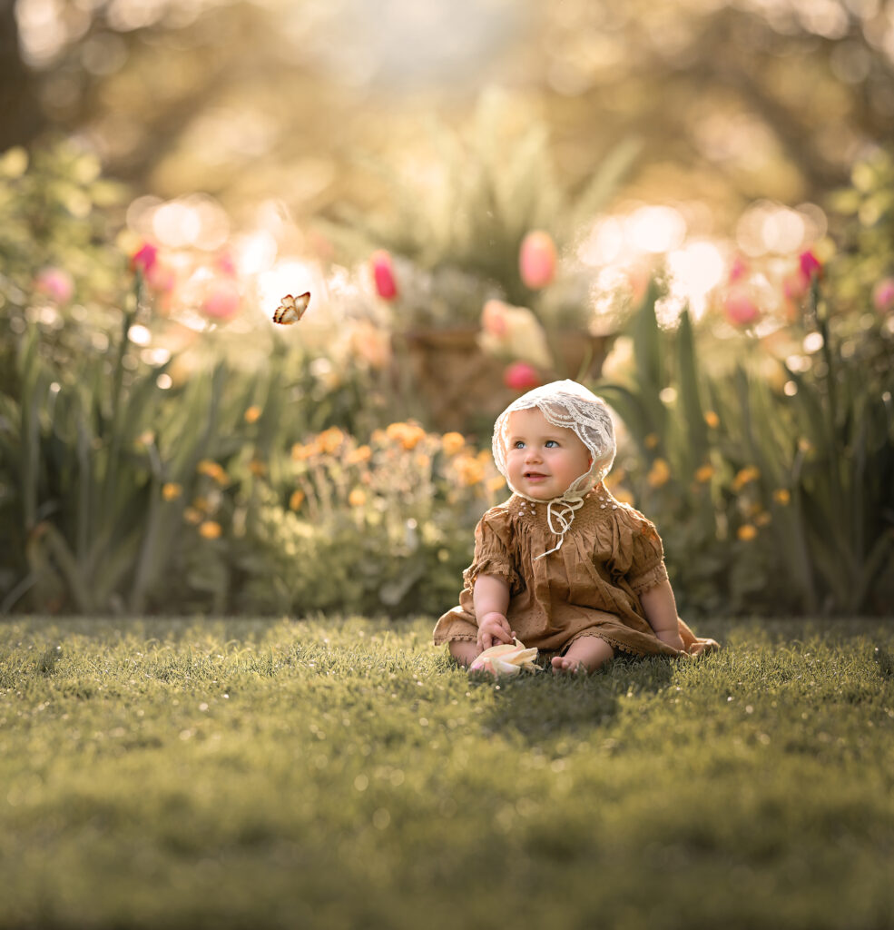 Best Pediatricians in Virginia Beach. Photo of baby girl among flowers. 