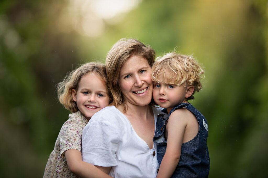 Photo of Mom and her children at the park during sunset by Iya Estrellado, a Virginia Beach Photographer. Pediatricians in Virginia Beach.